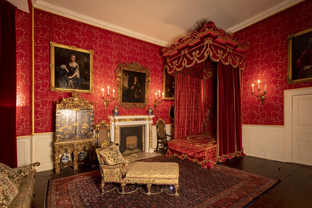 A red room at Temple Newsam, with red wallpaper, a red bed and red curtains