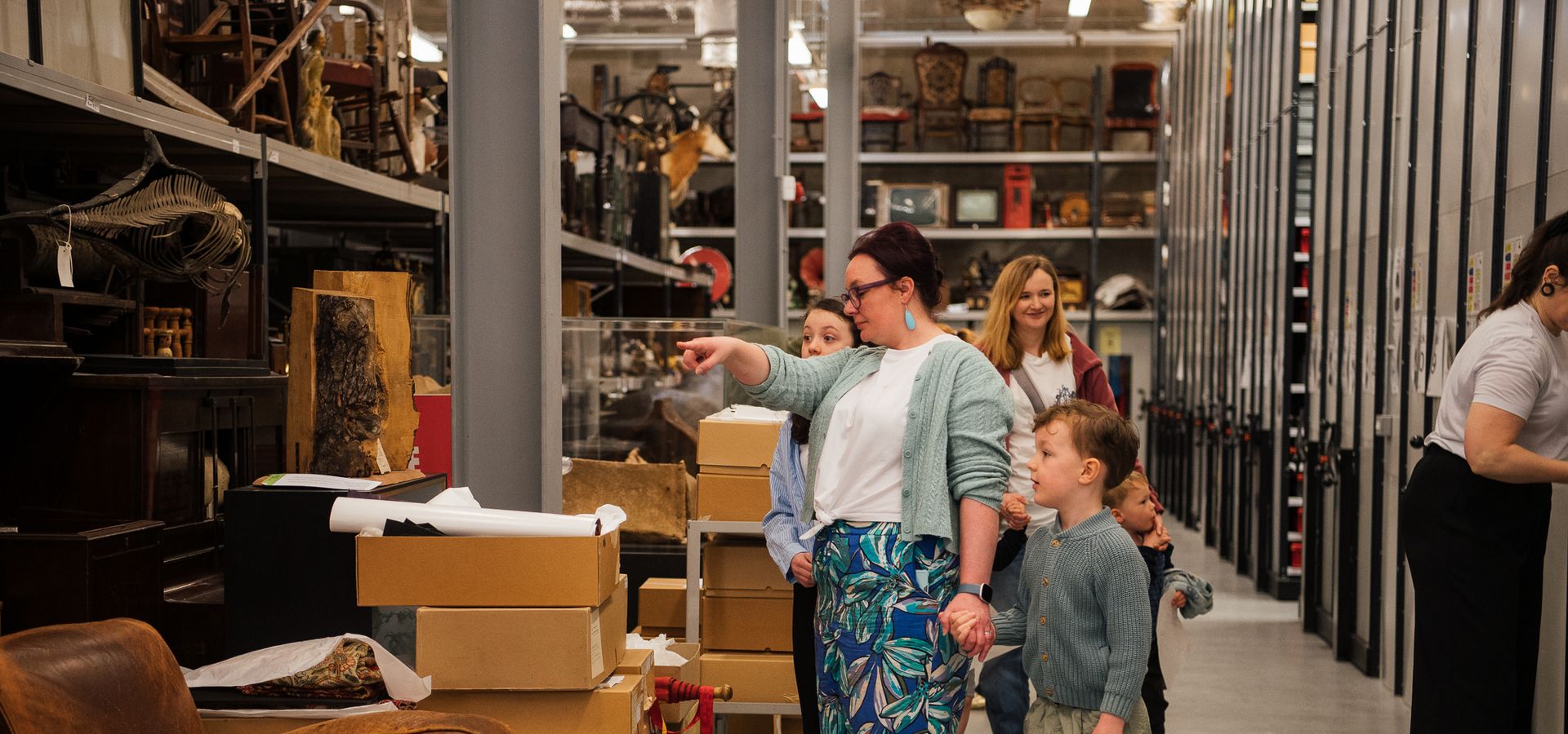 A group looking around the Leeds Discovery Centre collection store