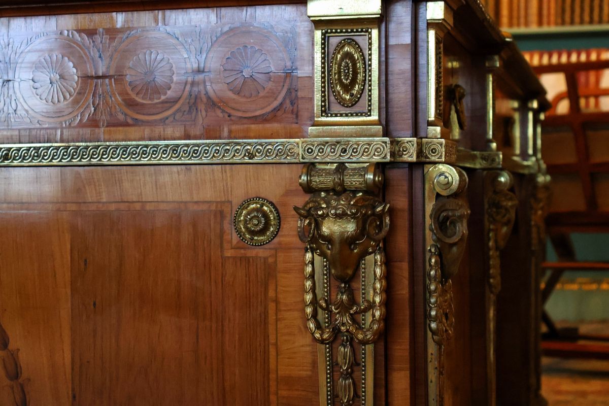 A close up detail of a Chippendale desk on display at Temple Newsam