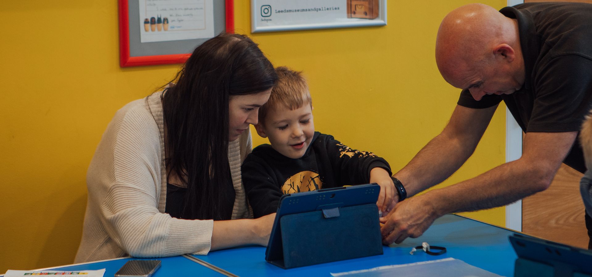 Parent and child using an ipad