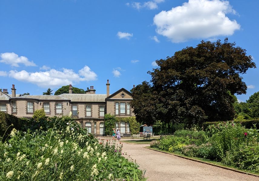 Lotherton House with gardens and a pathway surrounding