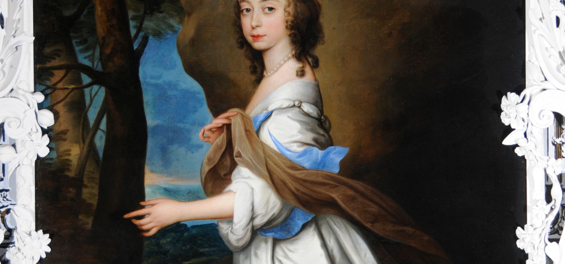 A portrait of a woman in a white dress with a blue silk scarf on display at Temple Newsam