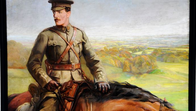 A portrait of a man in a military outfit on a horse