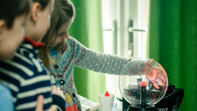 children playing with a glass ball
