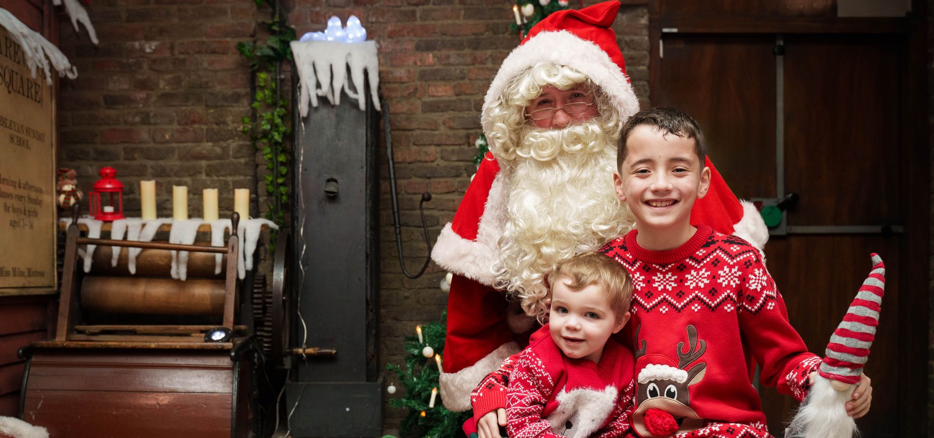 Santa sat with 2 children