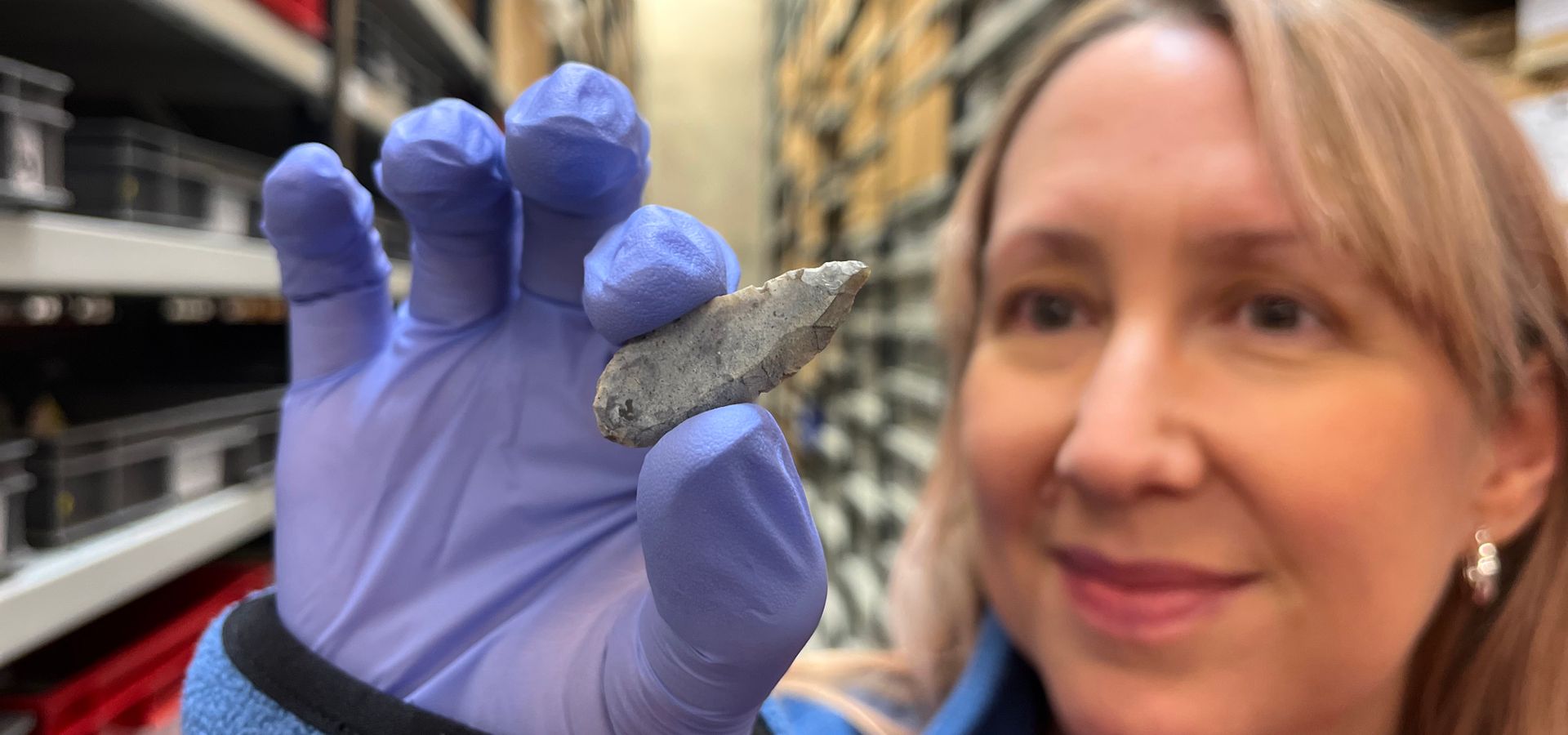 Kat Baxter, Leeds Museums and Galleries' curator of archaeology is shown here with an Early Neolithic, leaf-shaped arrowhead.
