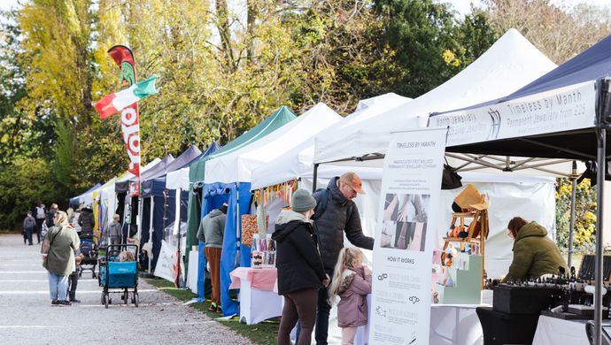 A row of market stalls and tents