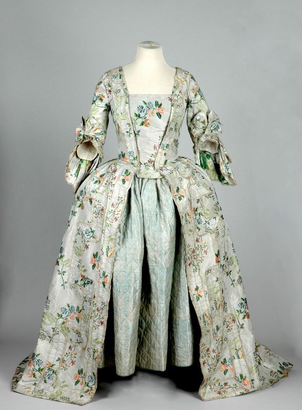 18th century dress made from high-quality, intricate silk fabrics woven in the Spitalfields district of East London,  front the front