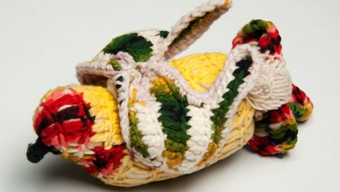 A crocheted bird