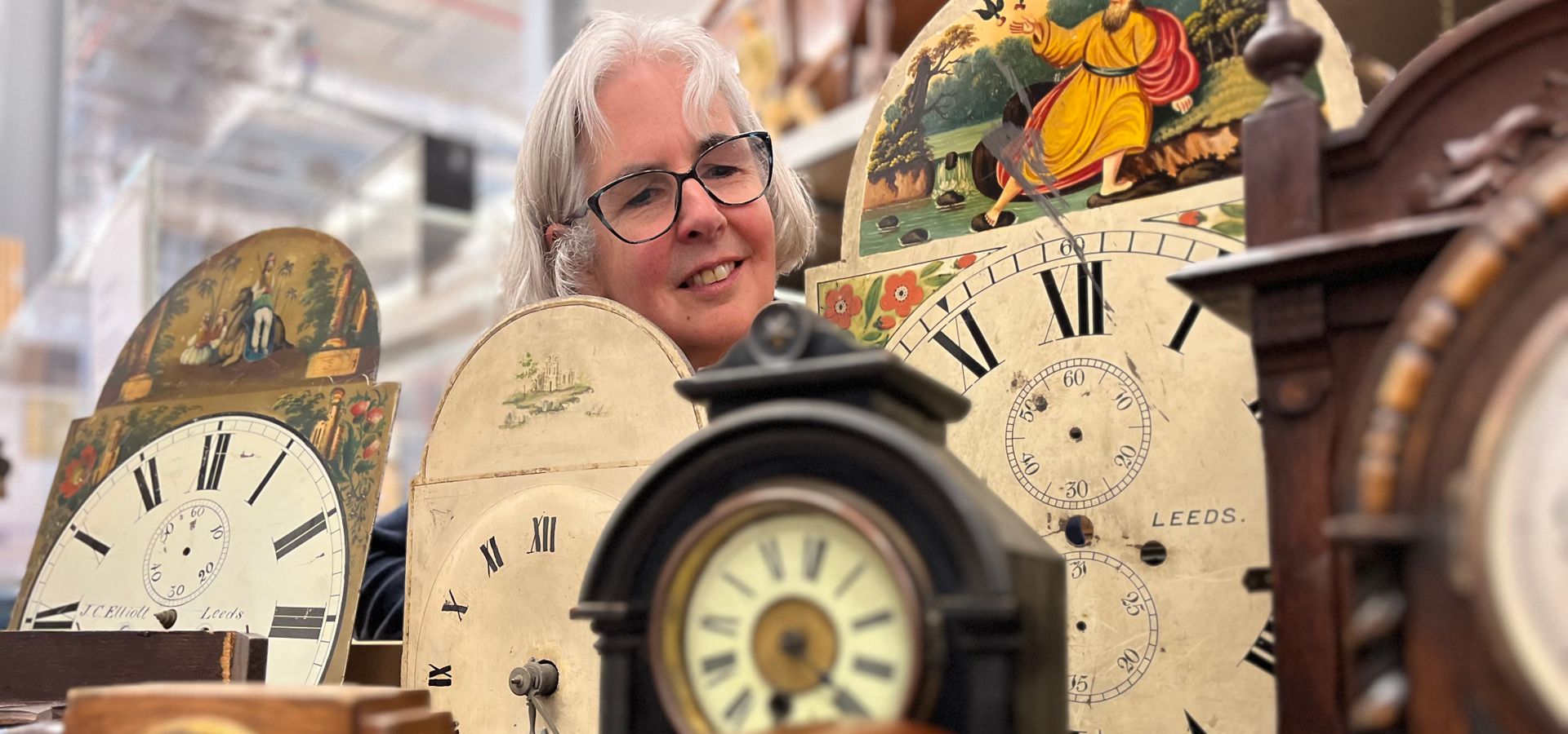 Kitty Ross, Leeds Museums and Galleries’ curator of social history, overlooking the museums collection of vintage clocks