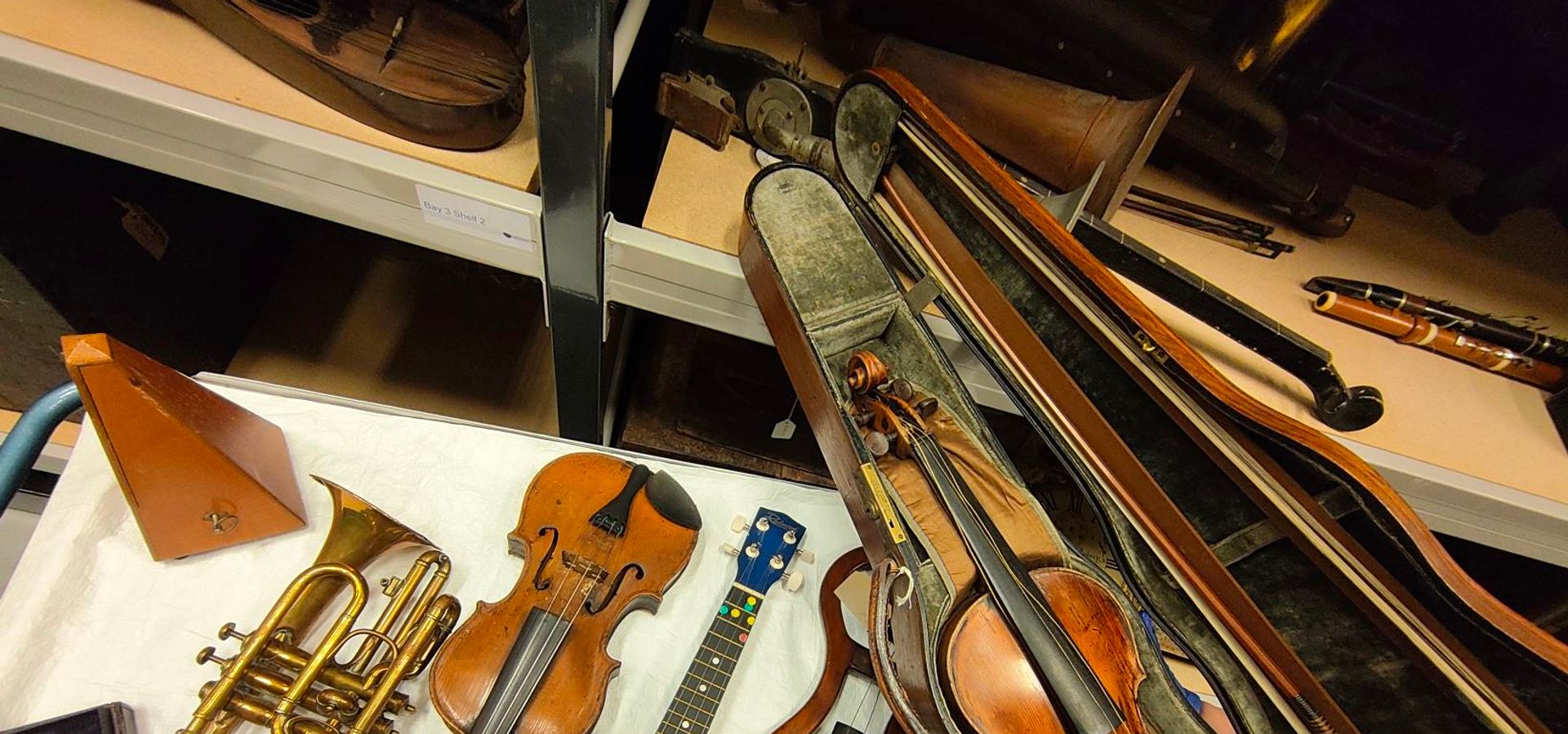 A group of musical instruments from the collection store at Leeds Discovery Centre