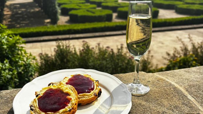 Cream tea and a glass of fizz overlooking the formal gardens from the south terrace of Temple Newsam