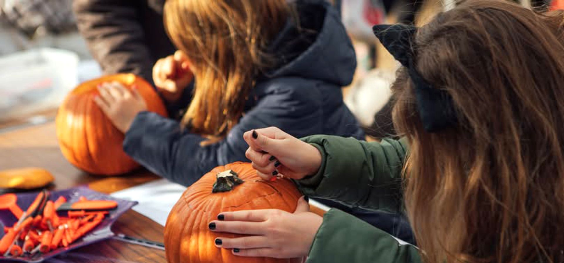 Children carving pumpkins