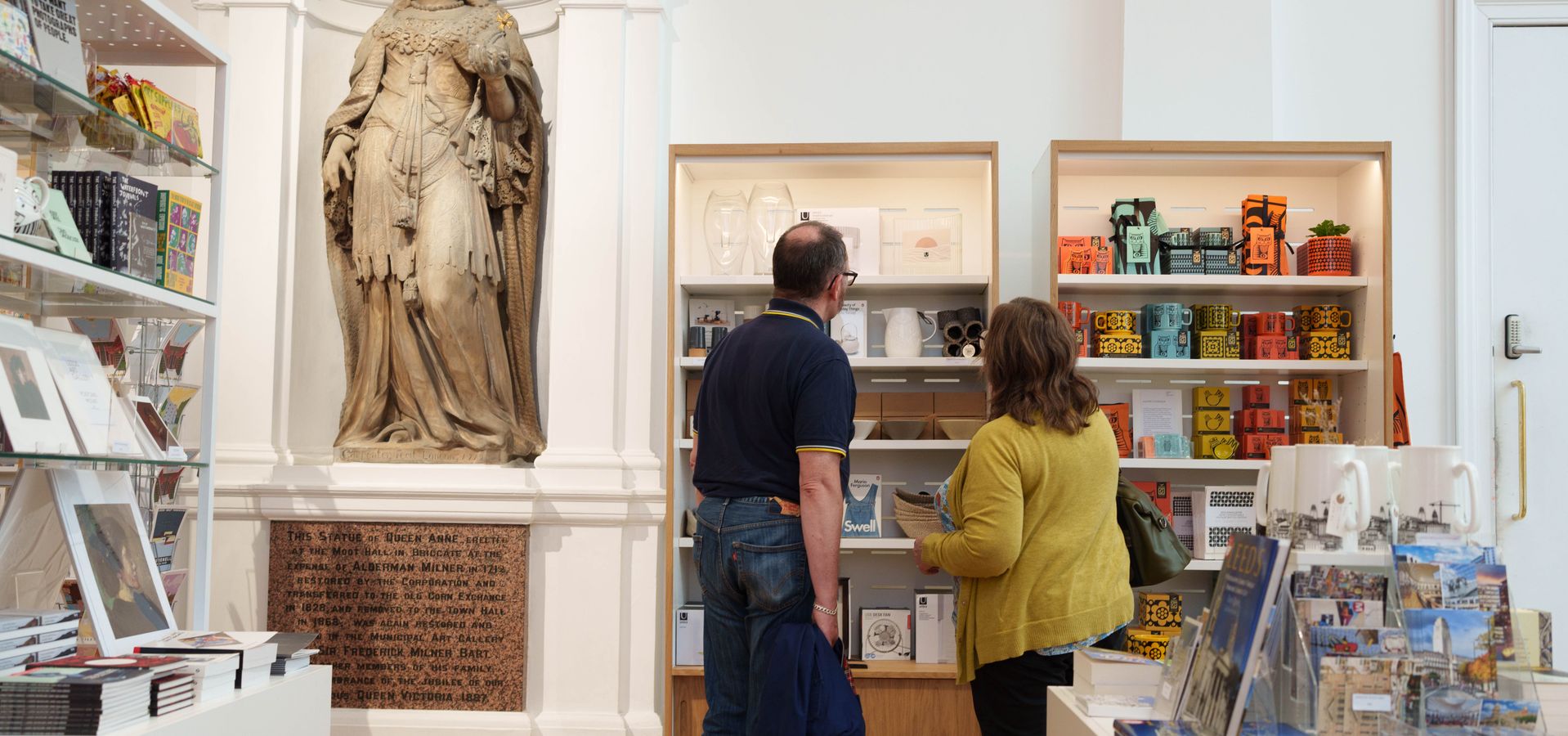 Two adults looking in a gift shop