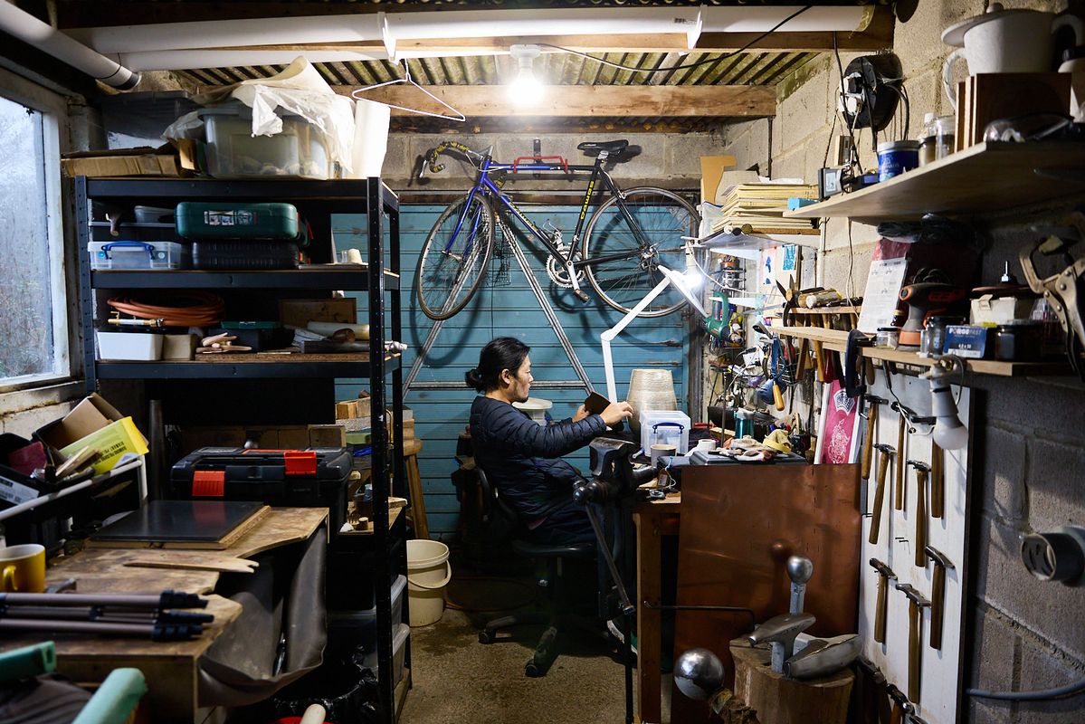 Artist Yusuke Yamamoto in workshop working on silver commission for Reflections in Silver
