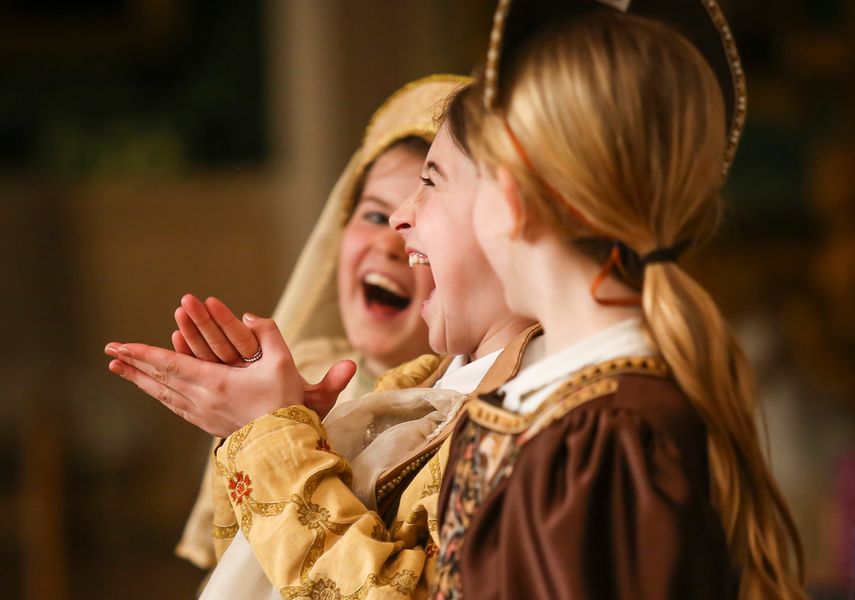 students in tudor costumes on Temple Newsam house