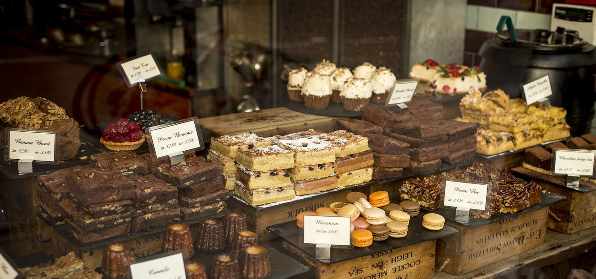 A stall of various baked goods and cakes