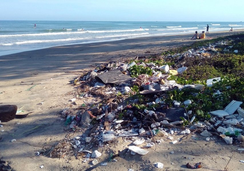 plastic waste washed up on a beach