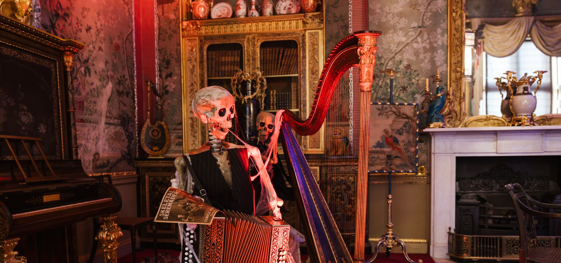 Skeletons playing musical instruments in the historic settling of Temple Newsam House