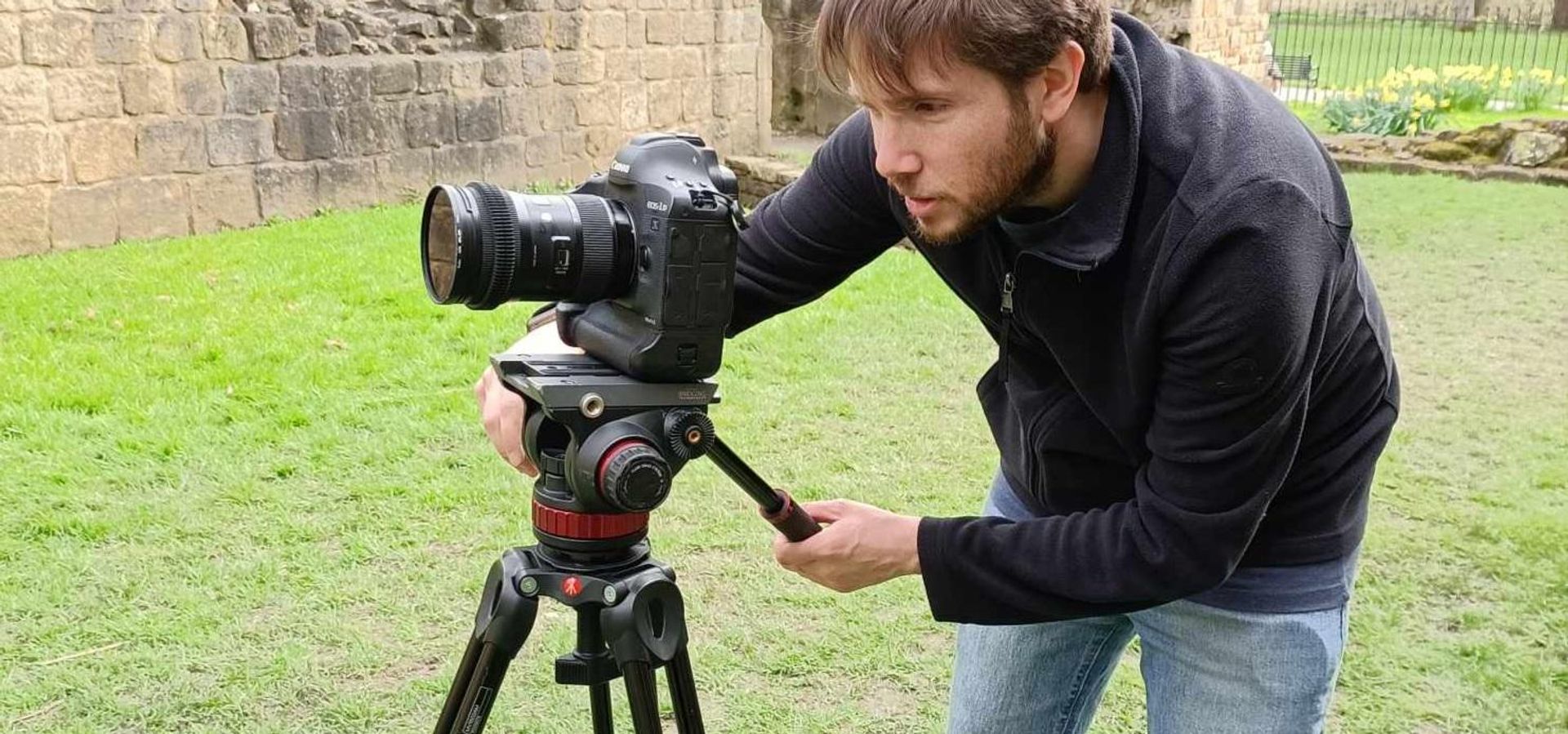 A photographer at Kirkstall Abbey