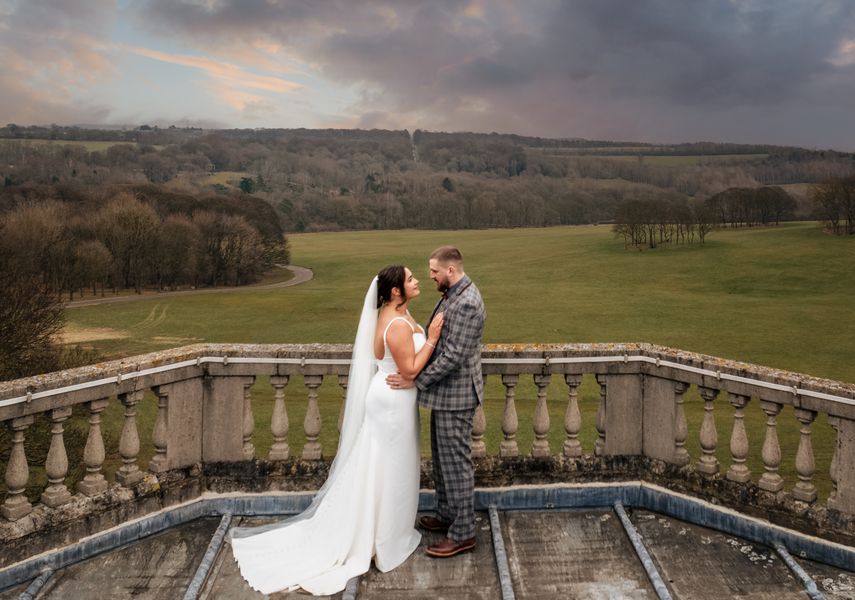 A bride and groom on the roof of Temple Newsam