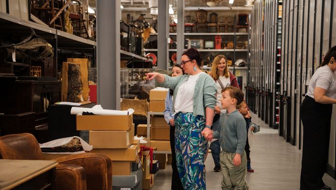 A group looking around the Leeds Discovery Centre collection store