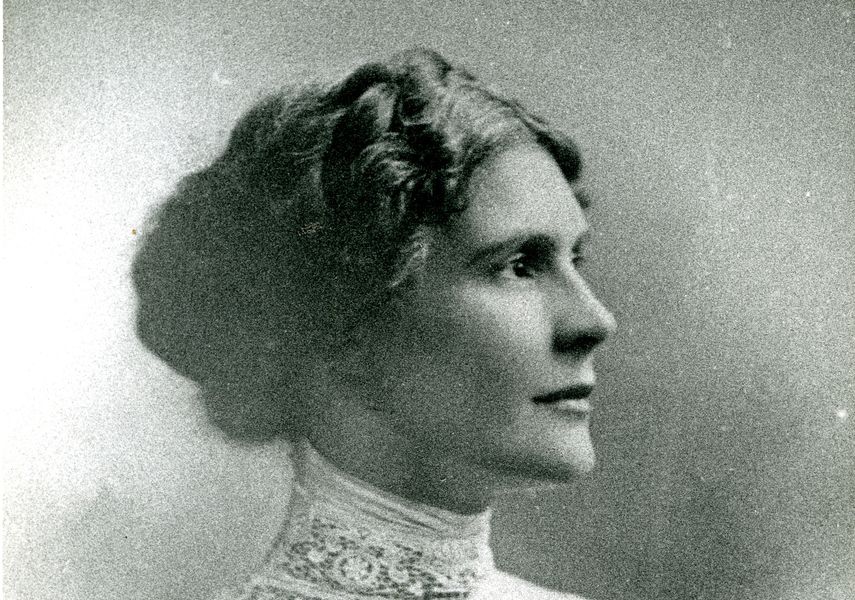 A black and white image of Leonora Cohen in a white shirt