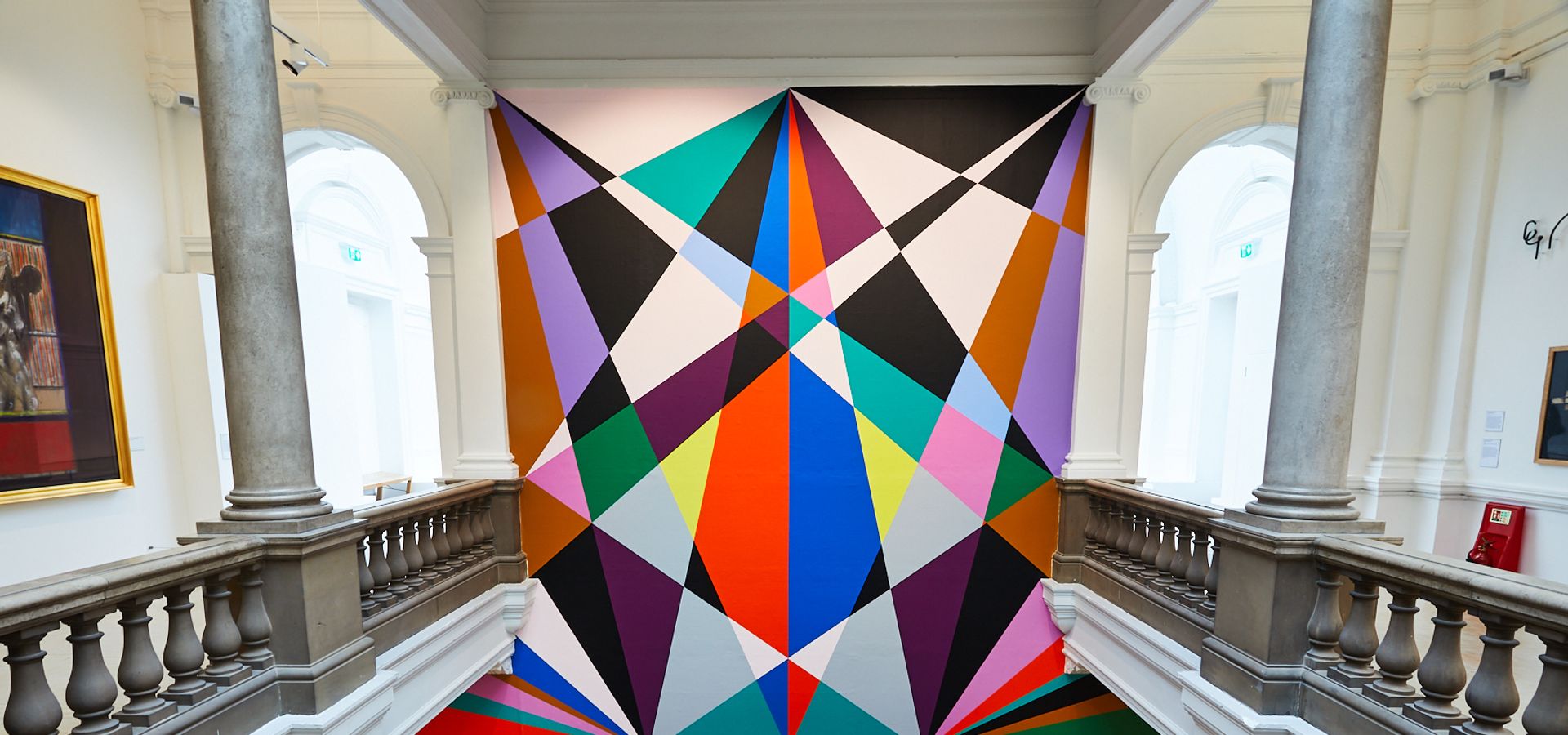 A geometric mural inside Leeds Art Gallery by Lothar Gotz