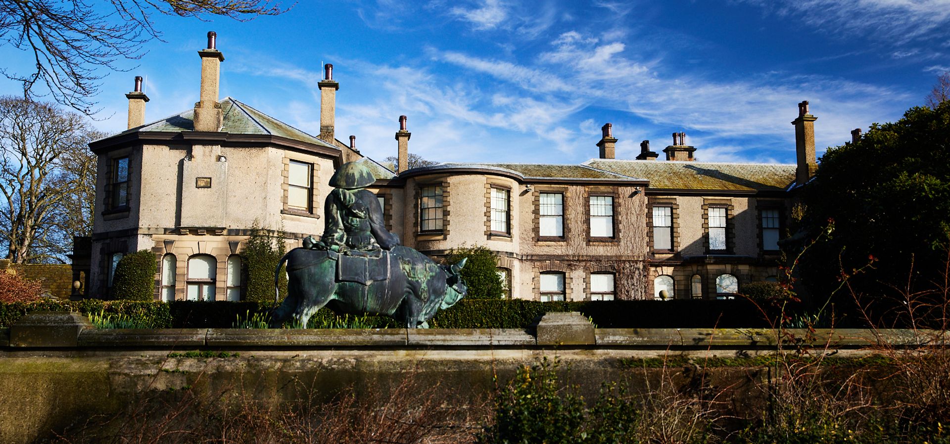 Lotherton House, with a garden sculpture of a boar in front