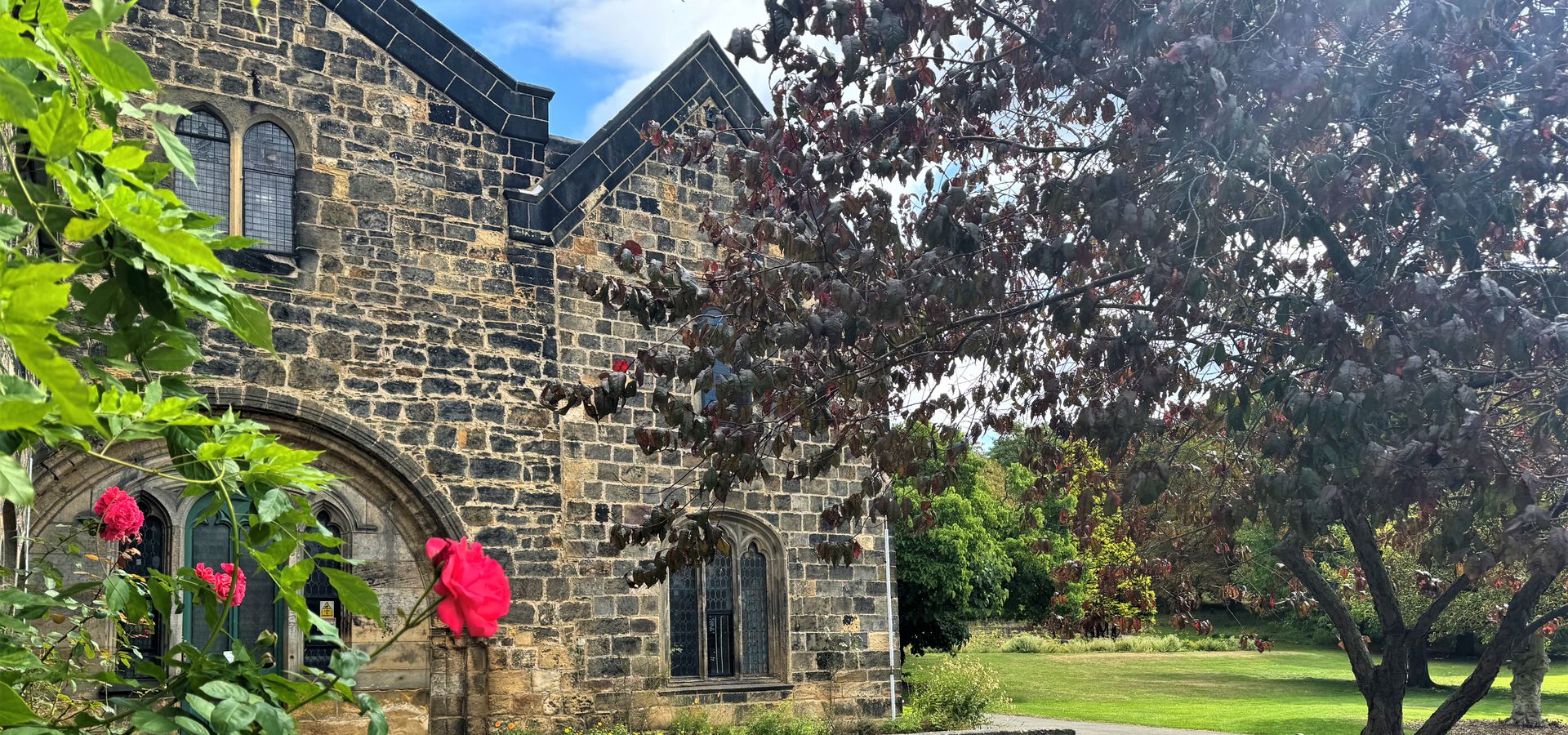 An outdoor area at Abbey House Museum with picnic benches