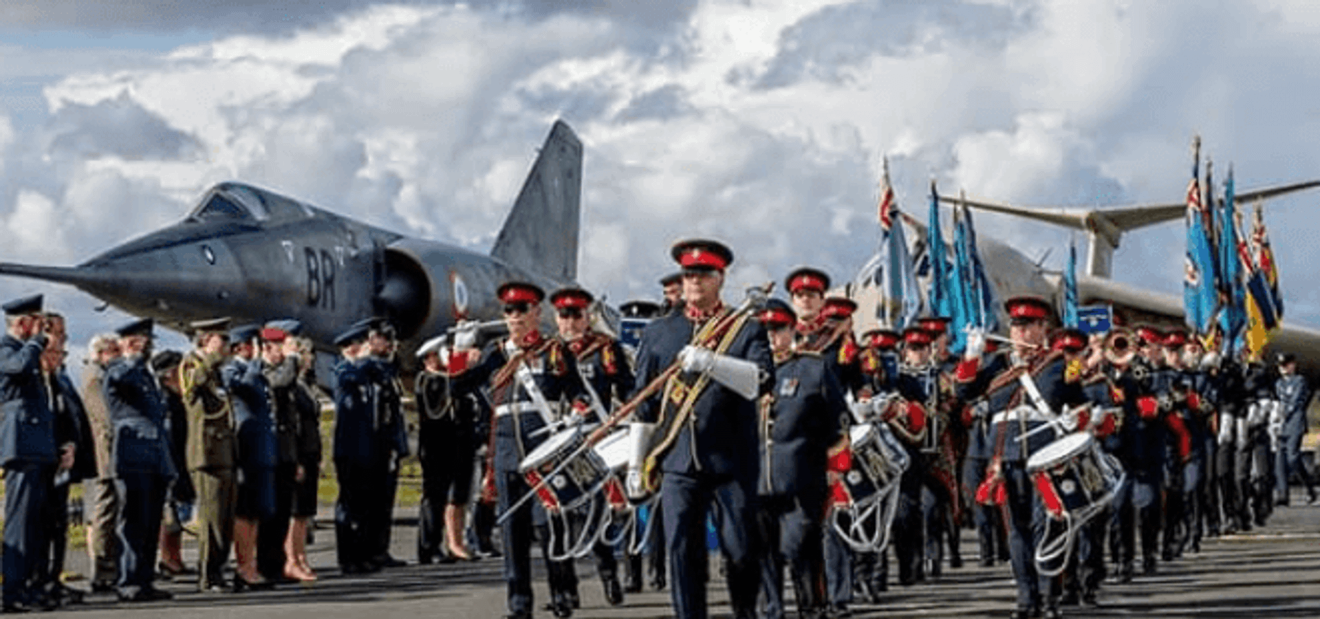 The Yorkshire Military Band in front of grounded planes