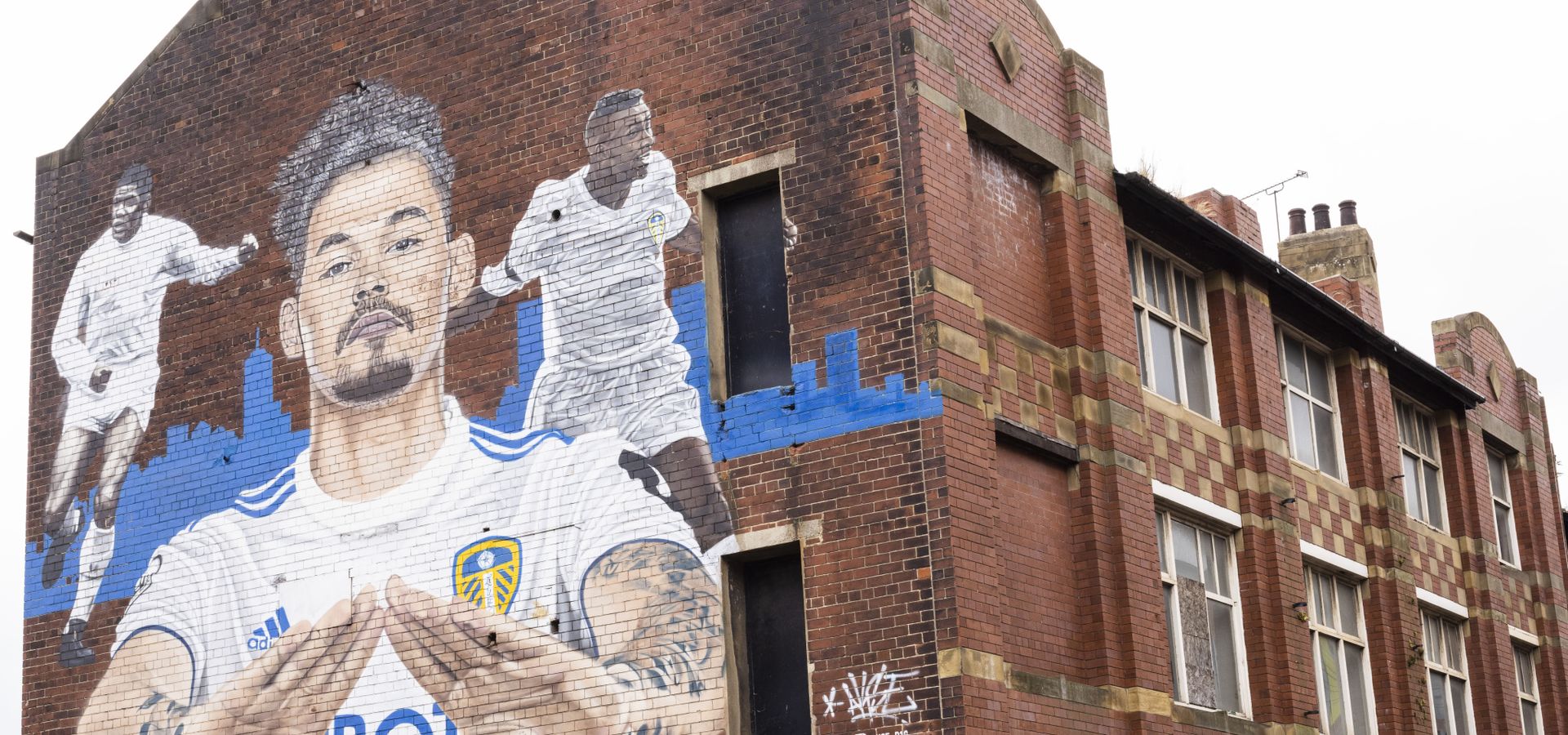 mural of Albert Johanneson alongside other black leeds players at Call Lane Leeds