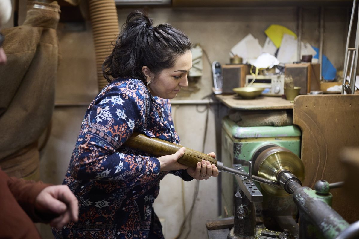 Miriam Handid shaping silver samples in her studio