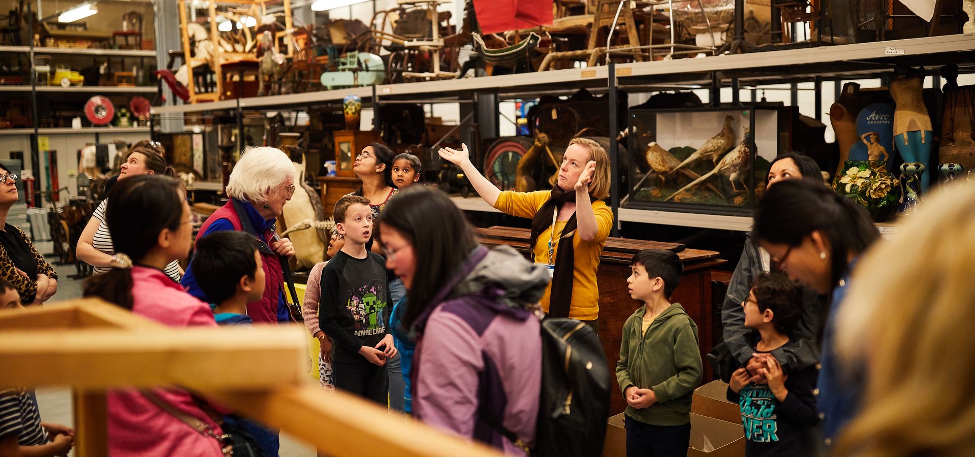 Families on a guided tour at Leeds Discovery Centre.