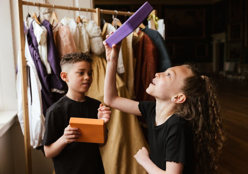 Two children playing with blocks and shapes in Temple Newsam House