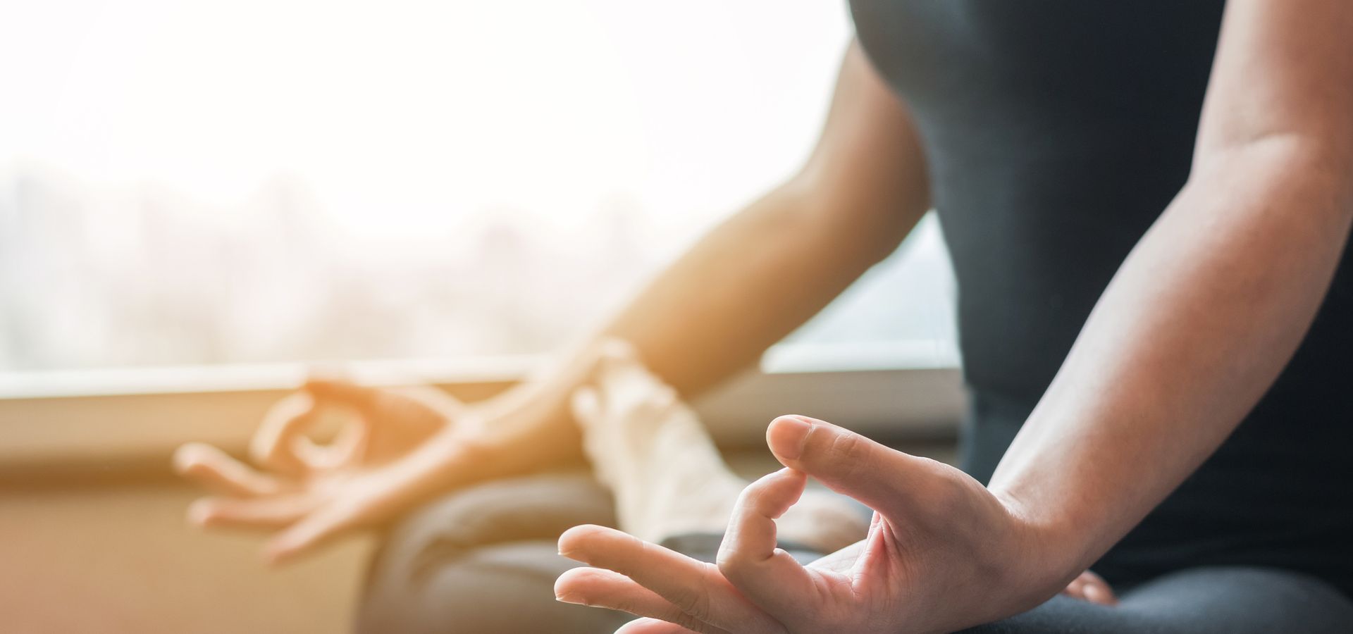 A women in a meditative pose