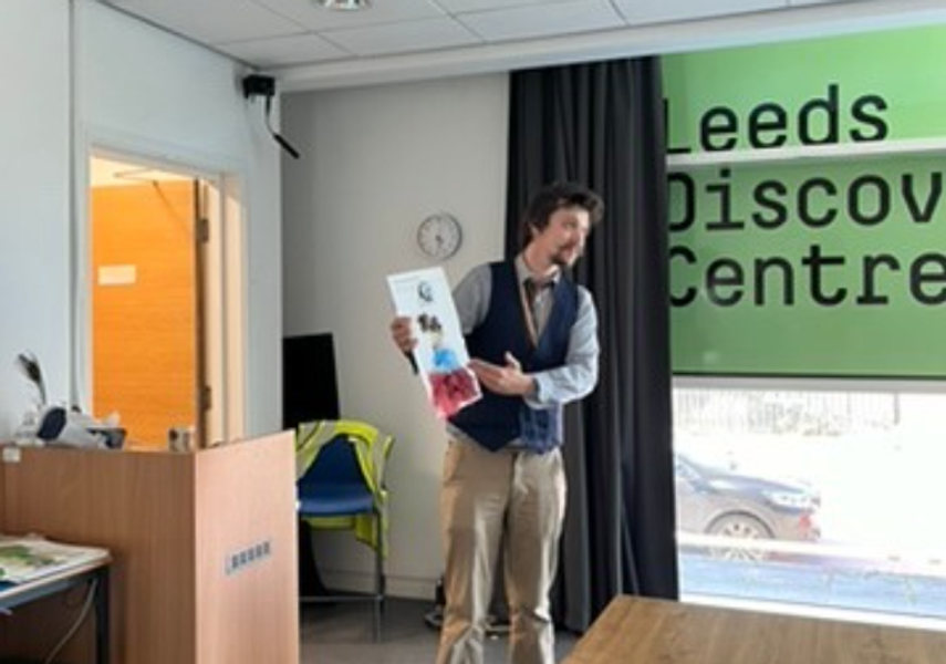 A workshop facilitator stood at the front of the Education Space delivering a workshop 