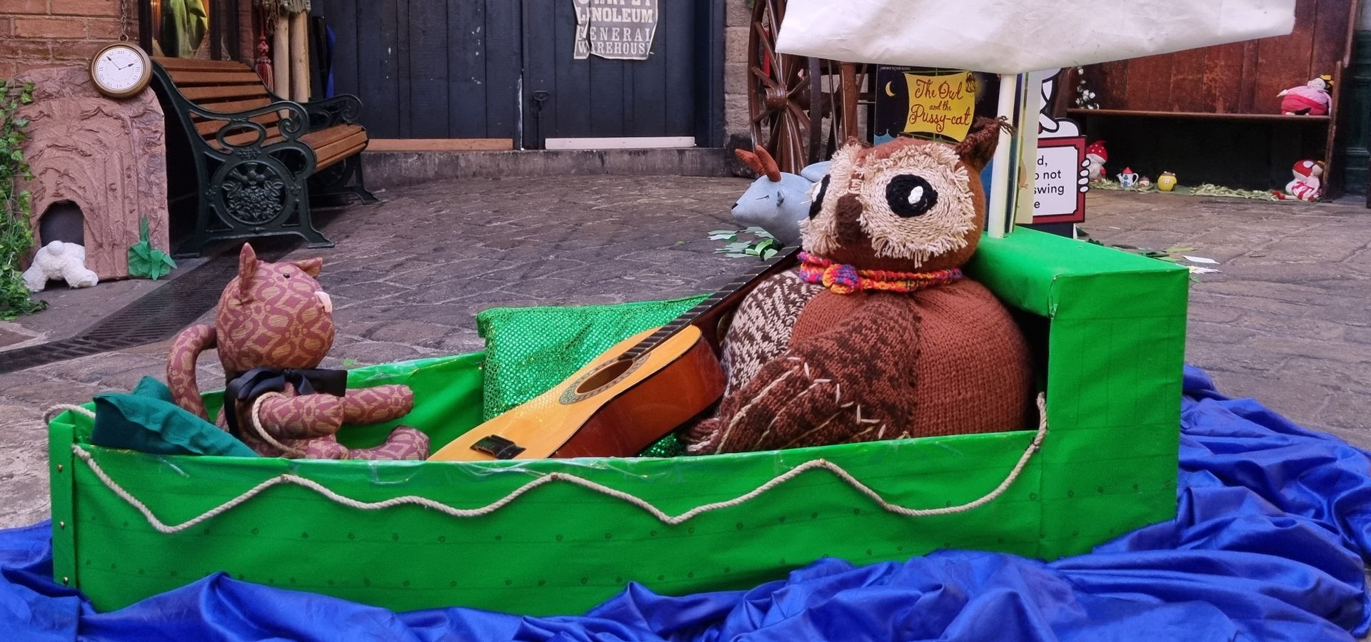 Owl and the pussy cat toy characters in the Victorian Streets of Abbey house museum