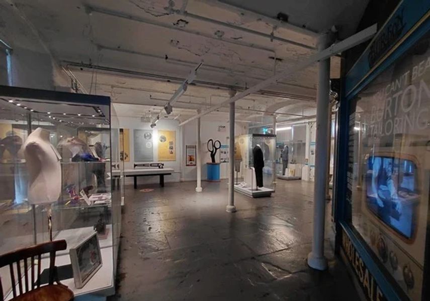 Photo of cabinets displaying tailored garments