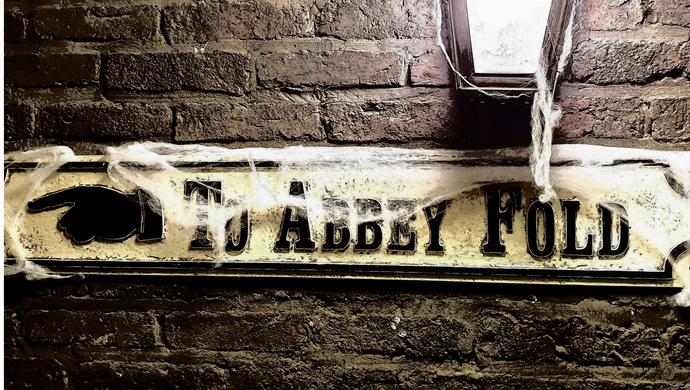 Abbey House Museum street sign with cobwebs for Halloween