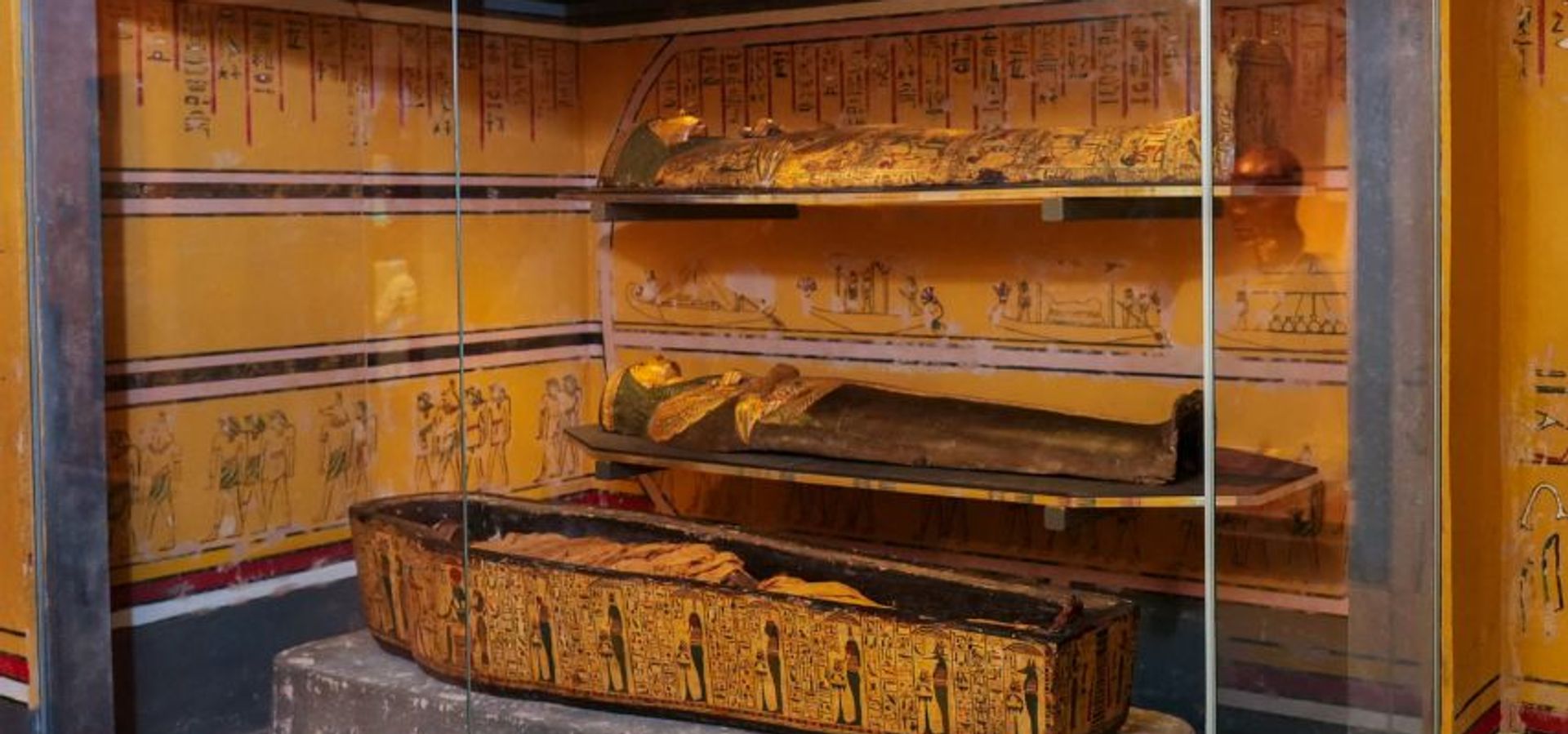 A wide shot photo of Nesyamun’s coffin displayed in the Leeds City Museum