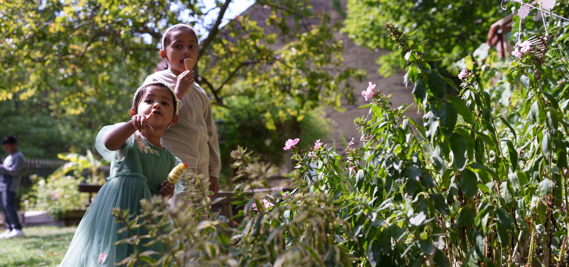 Two children eating ice creams in Leeds Industrial Museum's Colour Garden