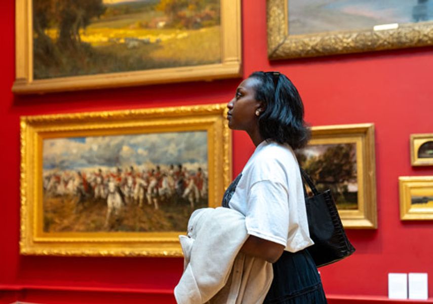 A person exploring Leeds Art Gallery