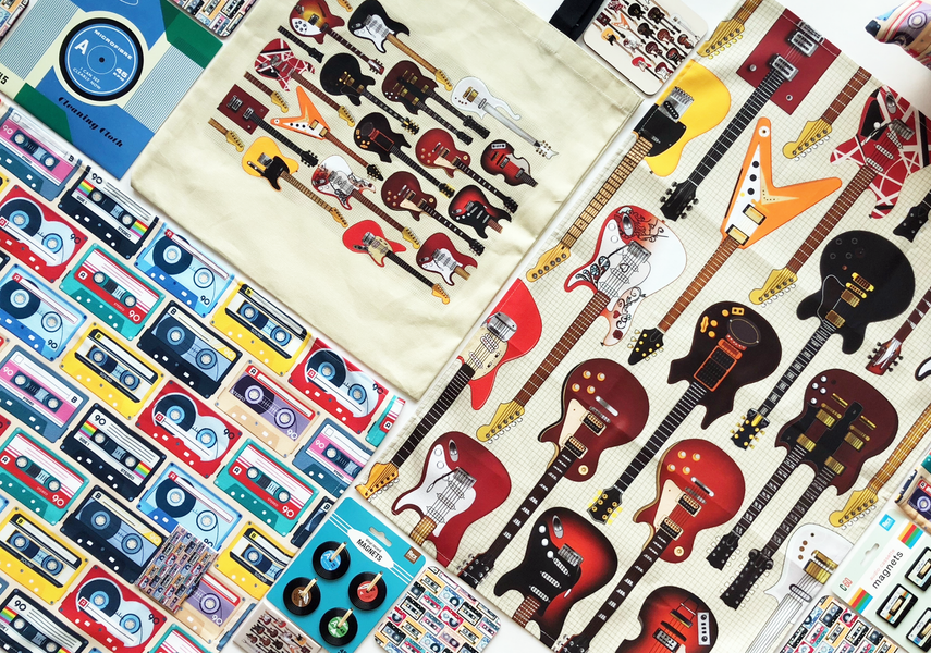 A mix of music shop products covered in gituars