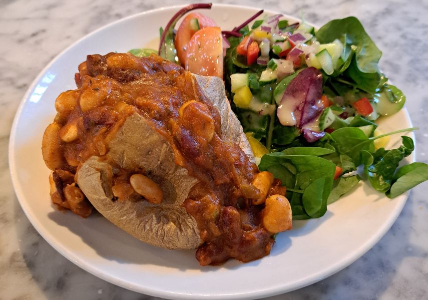 Jacket potato with salad and vegan 3 bean chilli