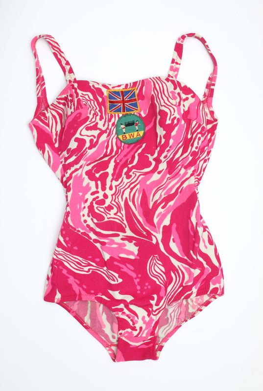 A pink marbled leotard with a British flag and BWA logo at the top