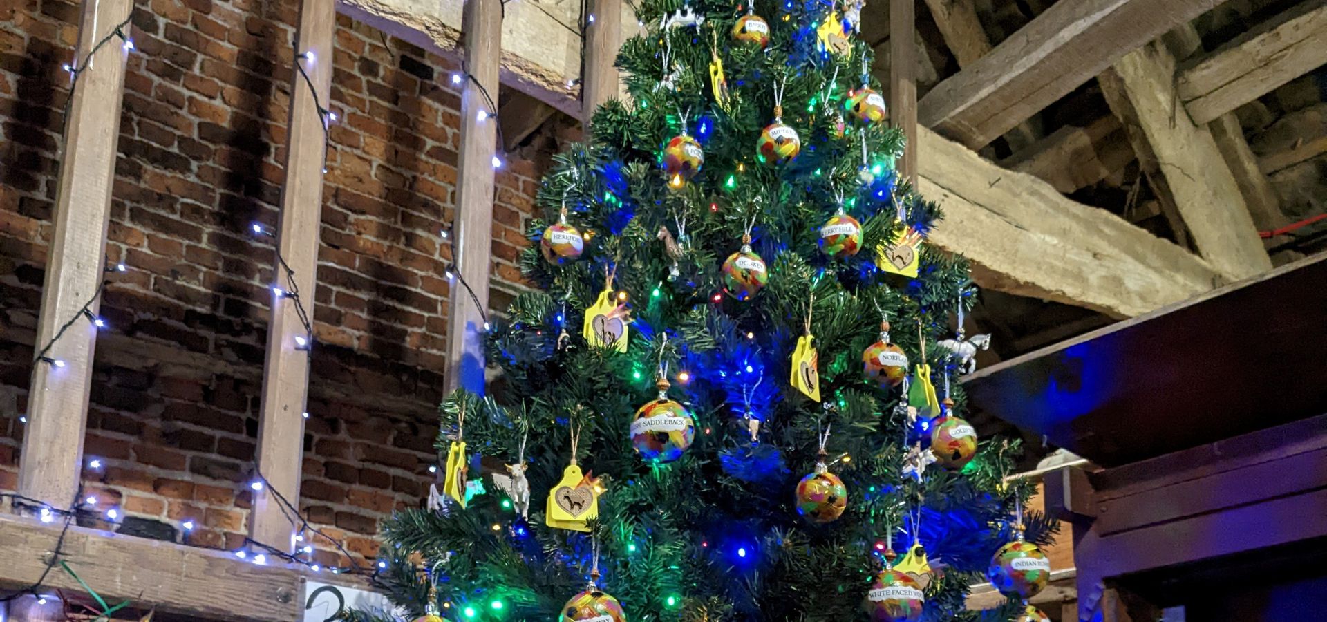 Decorated Christmas tree in a barn