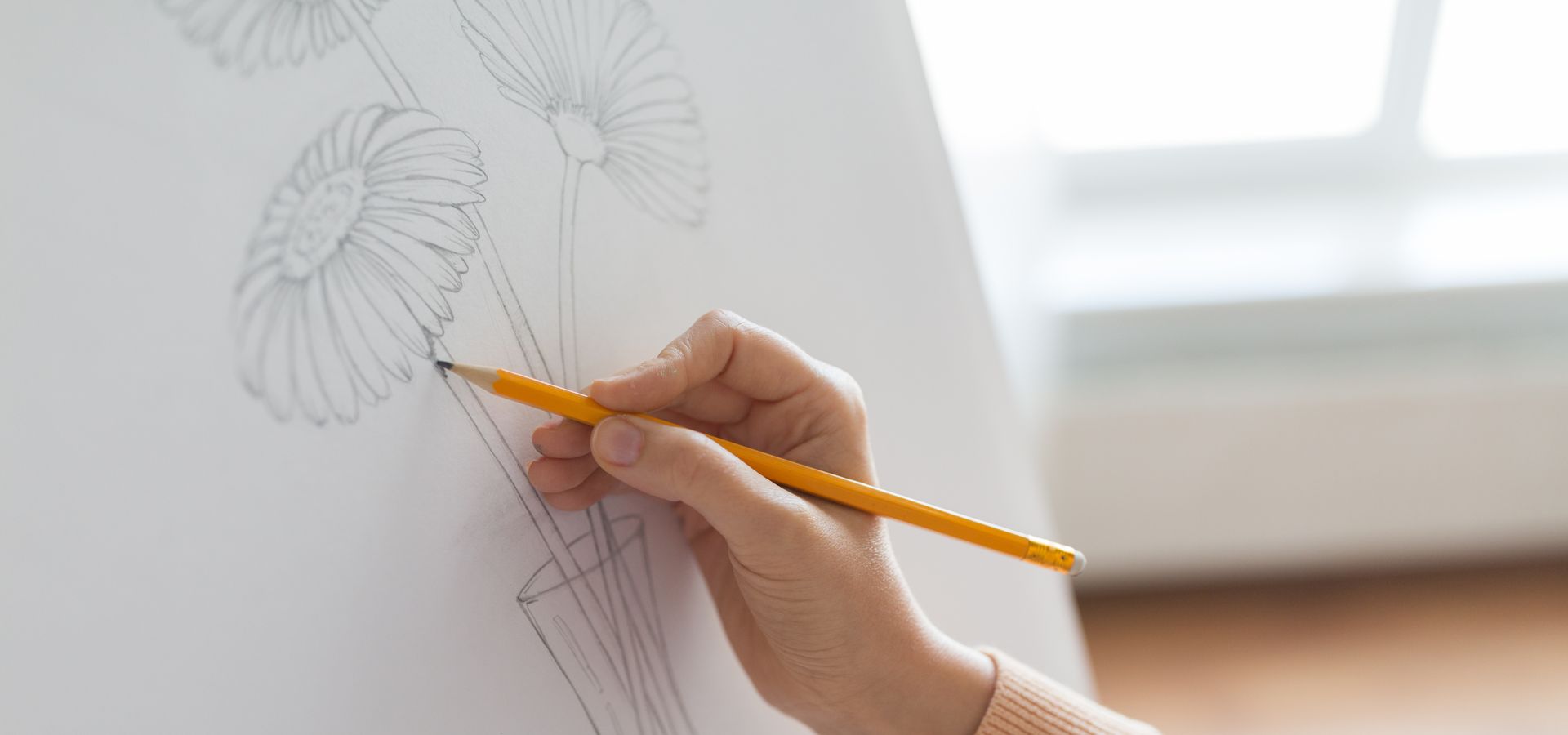 person drawing flowers