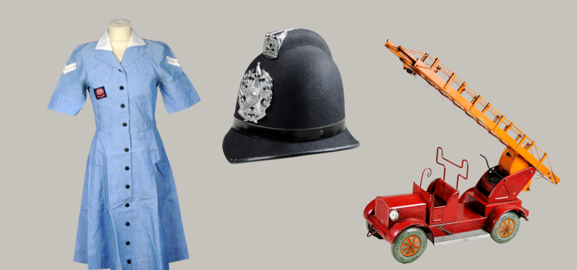 A nurse uniform, police helmet and model fire engine