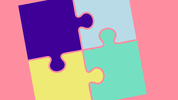 4 puzzle pieces in teal, navy, light blue and yellow on a pink background